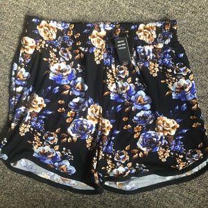 black blue floral dolphin shorts pockets